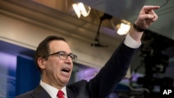 FILE - Treasury Secretary Steve Mnuchin takes a question in the briefing room of the White House in Washington, April 26, 2017, where he discussed President Donald Trump's tax proposals.