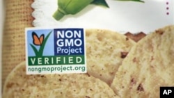 A product labeled with Non Genetically Modified Organism (GMO) is sold at the Lassens Natural Foods & Vitamins store in Los Angeles. Californians are considering Proposition 37, which would require labeling on all food made with altered genetic material. 