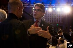 FILE - U.S. Energy Secretary Rick Perry attends the opening ceremony of an international clean energy conference held in Beijing, China, June 7, 2017.