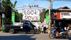 Warga di Yogyakarta dan kawasan lain mulai membatasi akses masuk kampung sebagai upaya meminimalisasi penyebaran virus corona. (Foto: VOA/ Nurhadi)