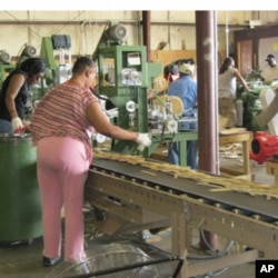 Workers process the product at Georgia Chopsticks.