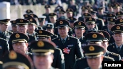 Đại biểu quân đội Trung Quốc đến Đại sảnh đường Nhân dân để dự cuộc họp Đại hội Đại biểu Nhân dân Toàn quốc ở Bắc Kinh