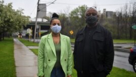 Lanessa Owens-Chaplin, lawyer, and David Rufus, I-81 Project Coordinator, New York Civil Liberties Union pose next to the I-81 freeway in Syracuse, New York, U.S., April 28, 2021.