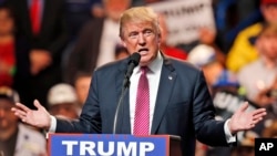 Republican presidential candidate Donald Trump gestures during a rally in Charleston, West Virginia, May 5, 2016. 