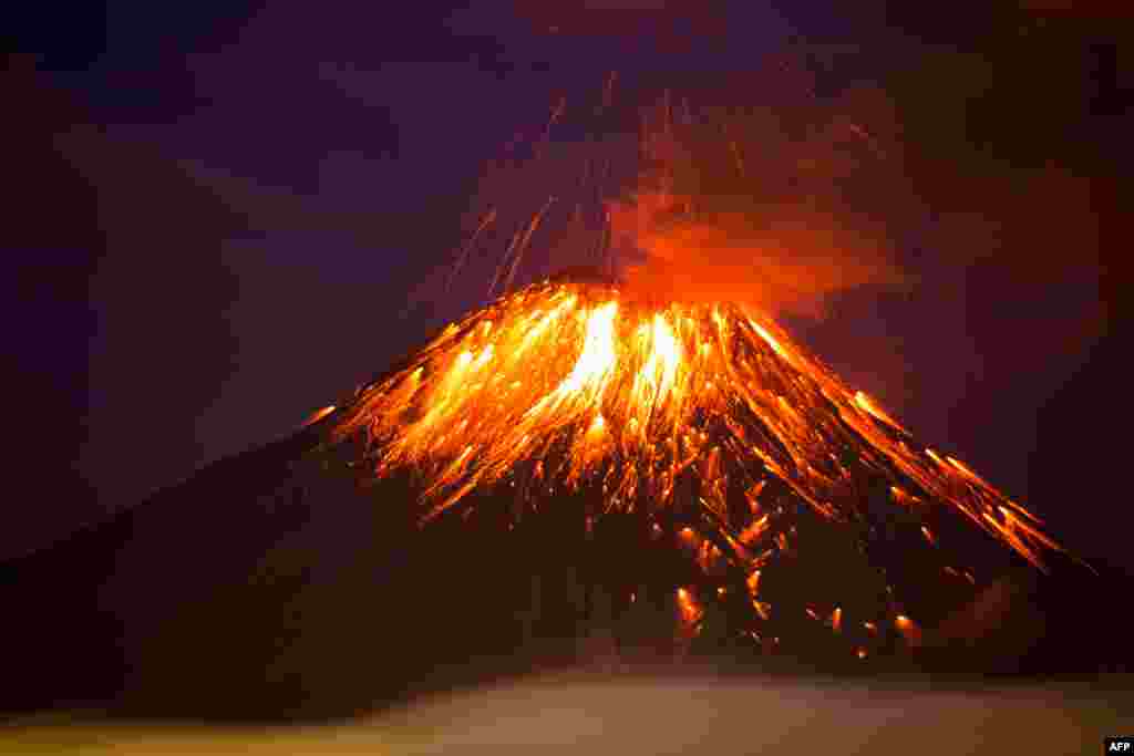 The Tungurahua volcano spews fumes and lava in Huambalo, Ecuador, Feb. 27, 2016.