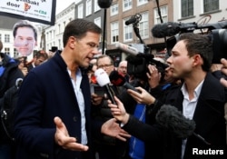 Dutch Prime Minister Mark Rutte of the VVD Liberal party speaks to the media as he campaigns for the 2017 Dutch election in Breda, Netherlands, March 11, 2017.