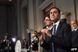 FILE - Anti-establishment Five Star Movement (M5S) leader Luigi Di Maio speaks to the press after a meeting with Italian President Sergio Mattarella as part of consultations of political parties to form a government, on May 14, 2018 at the Quirinale palace in Rome.