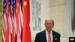 FILE - Commerce Secretary Wilbur Ross arrives at a State Dinner at the Great Hall of the People, Nov. 9, 2017, in Beijing, China.