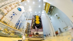 This file photo, taken on December 11, NASA’s James Webb Space Telescope was secured on top of the Ariane 5 rocket that will launch it to space from Europe’s Spaceport in French Guiana. (Image credit: ESA-M.Pedoussaut)