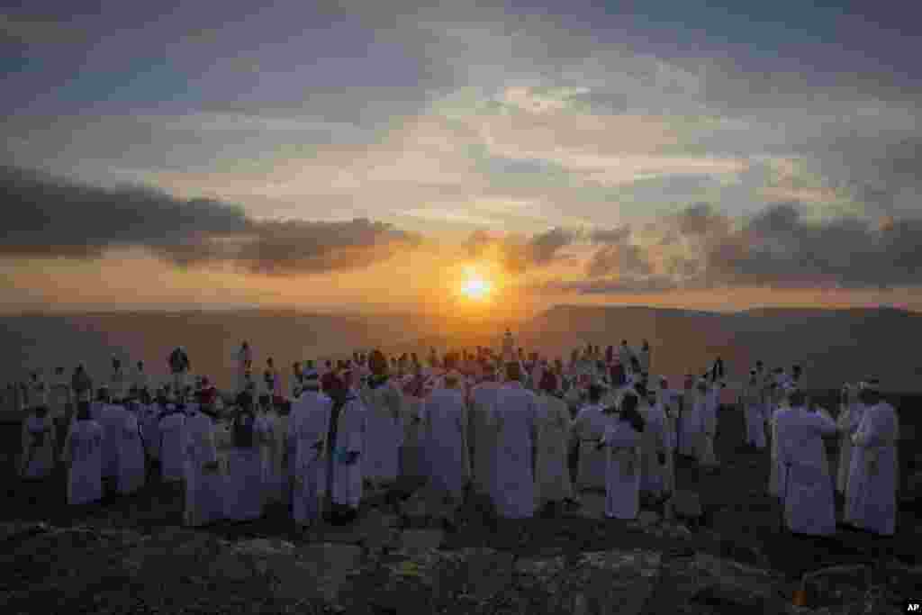 Members of the ancient Samaritan community attend the pilgrimage for the holiday of the Tabernacles, or Sukkot, at the religion&#39;s holiest site on the top of Mount Gerizim, near the West Bank town of Nablus.