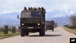 Azerbaijan and Armenian separatists in the region of Nagorno-Karabakh reached an agreement to end days of fighting in the disputed area.