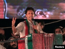 Opposition leader Imran Khan speaks to supporters during a celebration rally after the Supreme Court disqualified Prime Minister Nawaz Sharif in Islamabad, Pakistan, July 30, 2017.