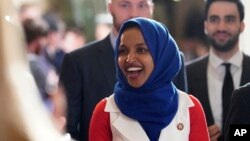 Rep. Ilhan Omar, D-Minn., arrives for President Donald Trump's State of the Union address to a joint session of Congress on Capitol Hill in Washington, Feb. 5, 2019. 