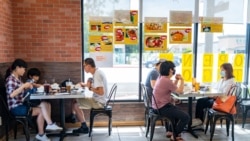 People eat at the Red Chicken Thai restaurant as Los Angeles County moves into life up restrictive coronavirus disease (COVID-19) disease reopening tier, in San Gabriel Valley, California, U.S., June 15, 2021