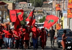 Members of the Economic Freedom Fighters (EFF) party make their way to attend a May Day rally in Alexandra Township, South Africa, May 1, 2019.