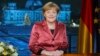Merkel Urges Germans to Welcome Refugees, Spurn Racism
