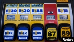FILE - A gas pump displays the price for E15, a gasoline with 15 percent of ethanol, and various other ethanol blends at a gas station in Nevada, Iowa, May 17, 2015.