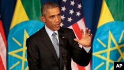 U.S. President Barack Obama gestures during a joint press conference with Ethiopian Prime Minister Hailemariam Desalegn at the National Palace in Addis Ababa, Ethiopia, July 27, 2015.