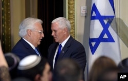 Vice President Mike Pence, right, was introduced to speak by U.S. Ambassador to Israel David Friedman, May 2, 2017, during a ceremony commemorating Israeli Independence Day.
