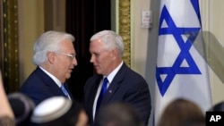 Vice President Mike Pence, right, was introduced to speak by U.S. Ambassador to Israel David Friedman, May 2, 2017, during a ceremony commemorating Israeli Independence Day. 