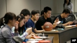 FILE - Students attend a new student orientation at the University of Texas at Dallas in Richardson, Texas, Aug. 22, 2015.