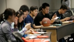 FILE - Students attend a new student orientation at the University of Texas at Dallas in Richardson, Texas, Aug. 22, 2015.