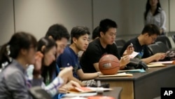 FILE - Students attend a new student orientation at the University of Texas at Dallas in Richardson, Texas, Aug. 22, 2015.