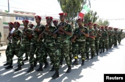 Soldiers participate in a military parade to mark the 24th self-declared independence day for the breakaway Somaliland nation in the capital Hargeysa, May 18, 2015.