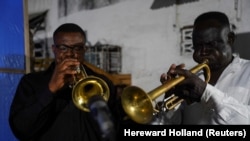 Musicians from the Bana OK music group play at La Septante on September 24, 2021. (REUTERS/Hereward Holland)