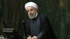 Iranian President Looks Ahead as Crippling Nuclear Sanctions End