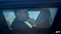 FILE - U.S. President Barack Obama is seen in an armored vehicle. Obama is meeting with the top Republican congressional leaders on Feb. 2, 2016, to see if they can reach accord on 2016 legislative goals.