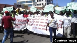 FILE: Striking workers of the National Railways of Zimbabwe stage peaceful protests in Zimbabwe's second largest city, Bulawayo. 