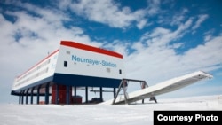 Researchers at Germany's Neumayer Station III recently picked 3.6 kilograms of salad greens, 18 cucumbers and 70 radishes grown in an experimental greenhouse as temperatures outside dropped below minus 20 degrees Celsius. (T. Steuer / Alfred-Wegener-Institut)