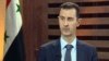 Syria's Assad: Government Facing 'Global Battle'
