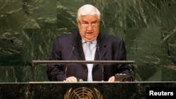 Syria's foreign minister, Walid al-Moualem, addresses the 69th United Nations General Assembly at U.N. headquarters in New York, Sept. 29, 2014.