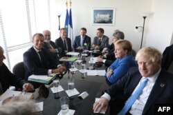 보리스 존슨 영국 총리, 앙겔라 메르켈 독일 총리와 에마뉘엘 마크롱 프랑스 대통령이 23일 유엔총회가 열리는 뉴욕 유엔본부에서 만나 회담했다.