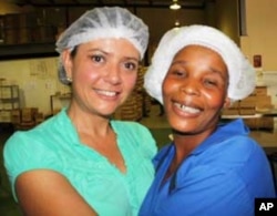 Gaby Agraz (left) with one of her loyal employees, Julia Mafoko....Gaby will support Mexico while Julia is backing South Africa at the World Cup