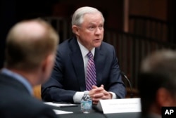 Attorney General Jeff Sessions speaks before a meeting of the Organized Crime Council and other officials to discuss implementation of a presidential executive order on organized crime at the Department of Justice in Washington, April 18, 2017.