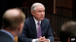 Attorney General Jeff Sessions speaks before a meeting of the Organized Crime Council and other officials to discuss implementation of a presidential executive order on organized crime at the Department of Justice in Washington, April 18, 2017.