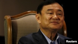 FILE - Former Thai Prime Minister Thaksin Shinawatra speaks to Reuters during an interview in Singapore, Feb. 23, 2016.