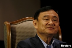 អតីត​នាយក​រដ្ឋ​មន្រ្តី​ថៃ​ លោក Thaksin Shinawatra ថ្លែង​ទៅ​កាន់​សារព័ត៌មាន Reuters ក្នុង​ប្រទេស​សិង្ហបុរី កាលពី​ថ្ងៃទី២៣ ខែកុម្ភៈ ឆ្នាំ២០១៦។