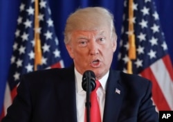 President Donald Trump speaks at Trump National Golf Club in Bedminster, N.J., Aug. 12, 2017.