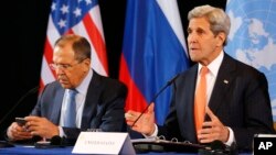 U.S. Secretary of State John Kerry, right, and Russian Foreign Minister Sergey Lavrov attend a news conference after the International Syria Support Group (ISSG) meeting in Munich, Germany, Feb. 12, 2016.