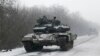 Ukraine, Rebels Continue Fight Over Town