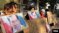 Long Kimheang, the wife of alleged an RT documentary about sex trafficking in Cambodia, along with other protestors sat outside the Russian Embassy in Phnom Penh, Cambodia, February 4, 2019. 