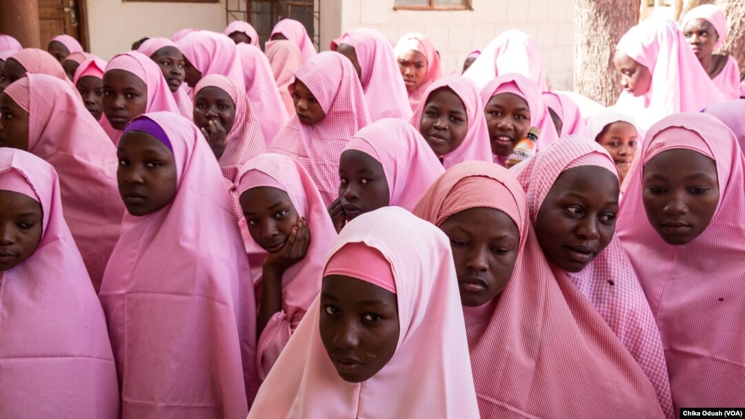 The Dapchi schoolgirls gather for morning assembly on the first day back to school after the February abduction.