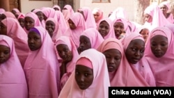 The Dapchi schoolgirls gather for morning assembly on the first day back to school after the February abduction.