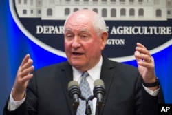 Secretary of Agriculture Sonny Perdue speaks at the Agriculture Department, in Washington, Dec. 13, 2018.