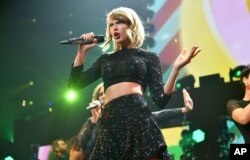 Taylor Swift performs at KIIS FM's Jingle Ball at the Staples Center on Dec. 5, 2014, in Los Angeles.