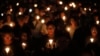 Tens of thousands of people attend an annual candlelight vigil at Hong Kong's Victoria Park, Monday, June 4, 2018. 